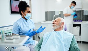 Man smiling in dental chair