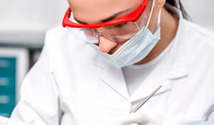 dentist wearing protective goggles