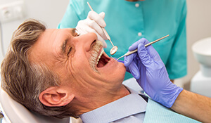 Elderly man enjoying his oral examination