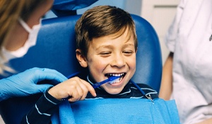 young boy in dental chair