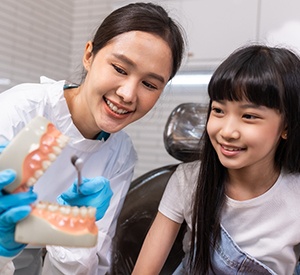 Girl smiling at the dentist