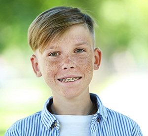 Boy smiling outside