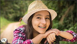 Young Lady leaning on bike