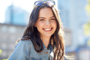 Woman with healthy teeth smiling